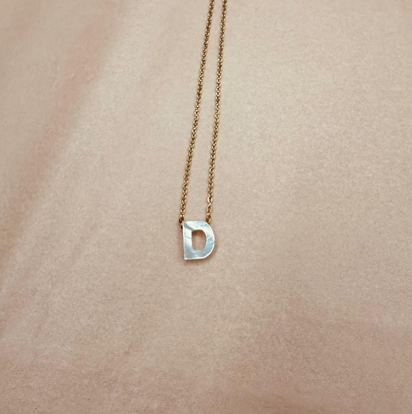 Inicial "D"
